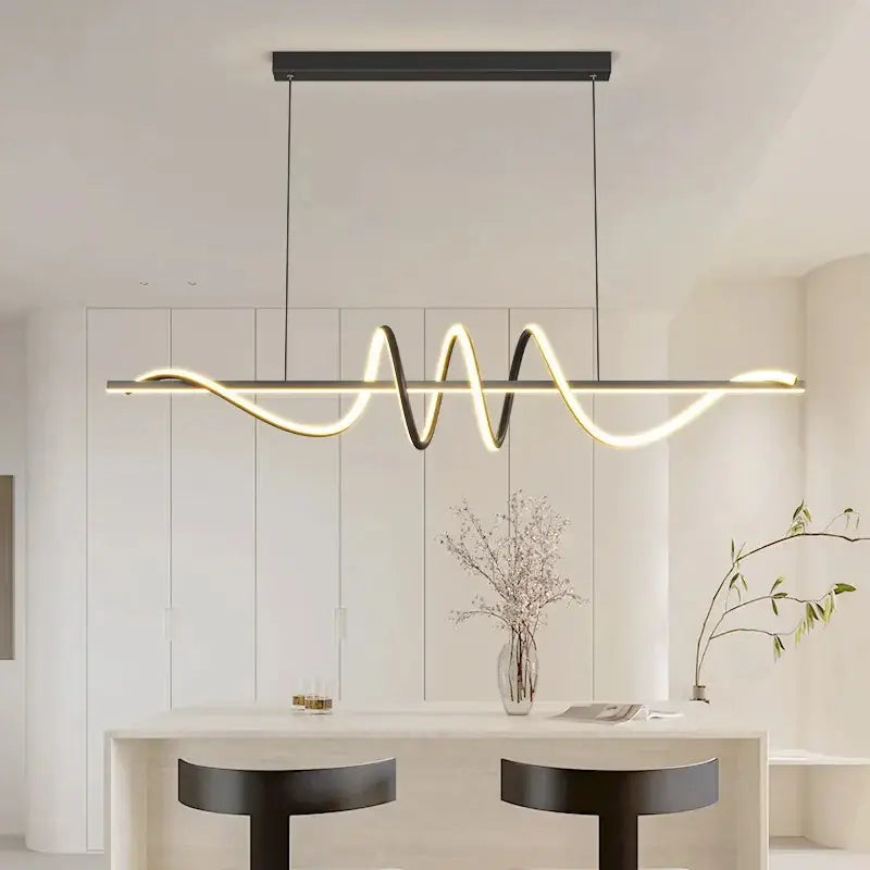 Sleek wavy pendant lights for dining room with brushed metallic finish