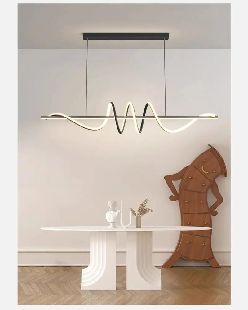 Sleek wavy pendant lights for dining room with brushed metallic finish