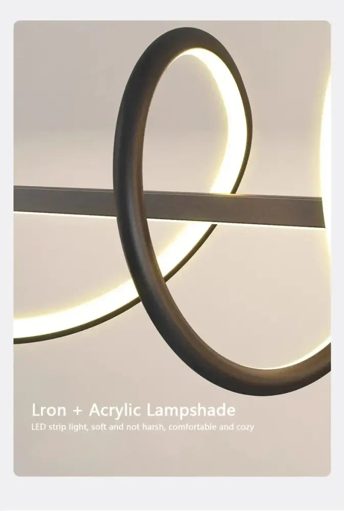 Sleek wavy pendant lights for dining room with brushed metallic finish