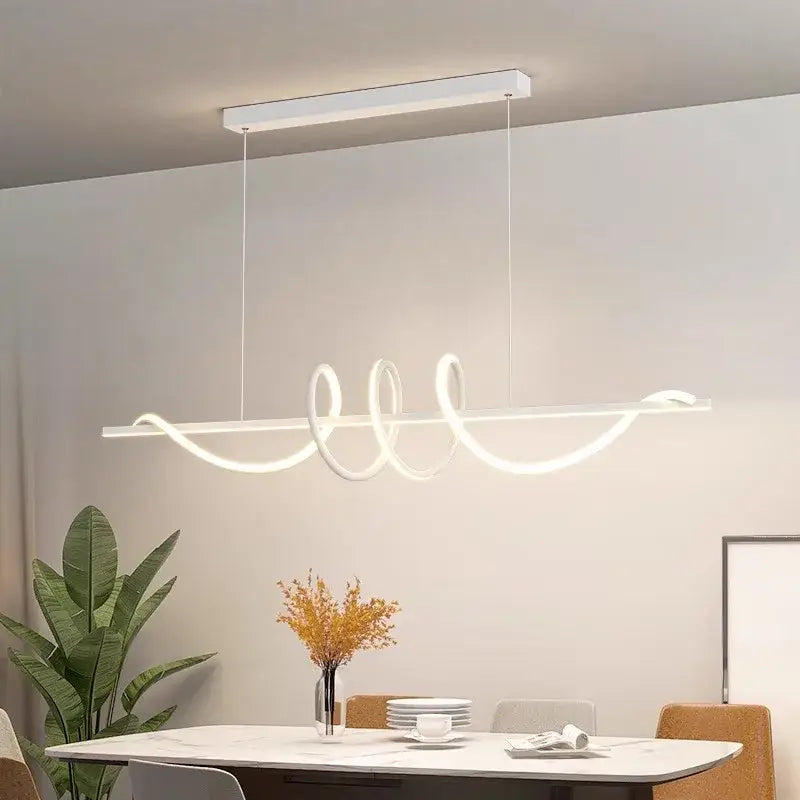 Sleek wavy pendant lights for dining room with brushed metallic finish
