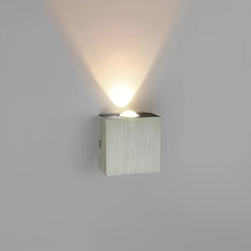 Modern brushed silver sphera wall sconces bedroom warm light beam
