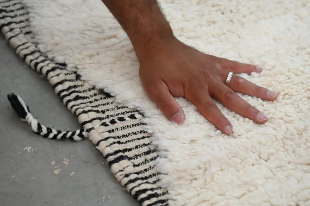 Handwoven cream and black tapis beni ouarain living room rug