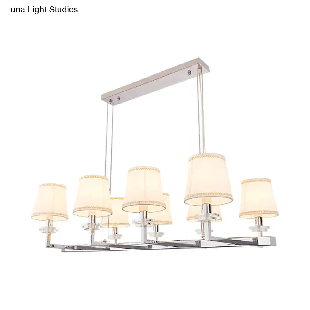 Modern chrome pendant light fixture with fabric shades dining room