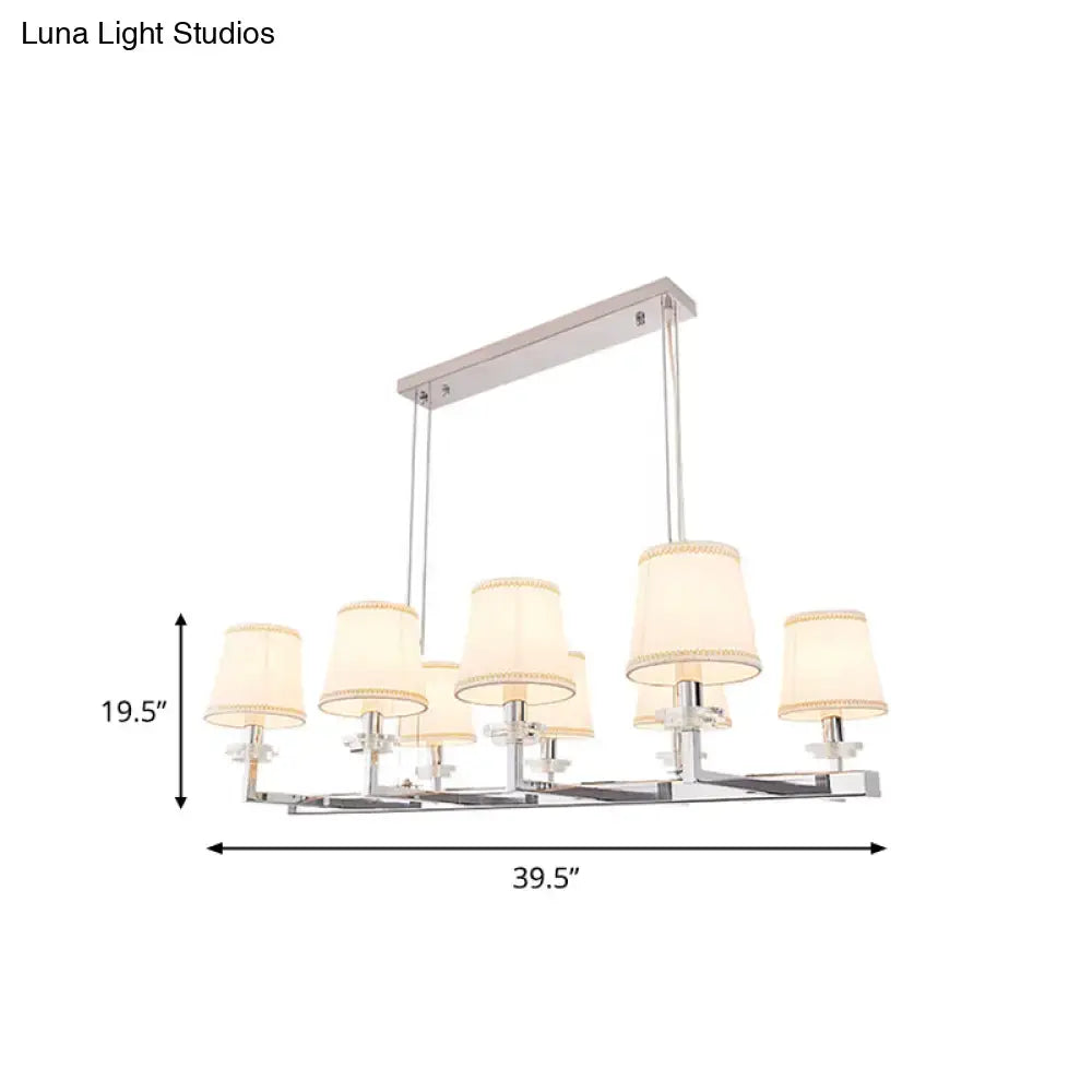 Modern chrome pendant light fixture with fabric shades dining room