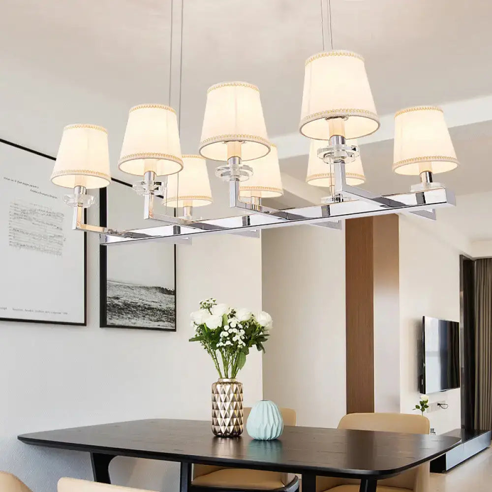 Modern chrome pendant light fixture with fabric shades dining room