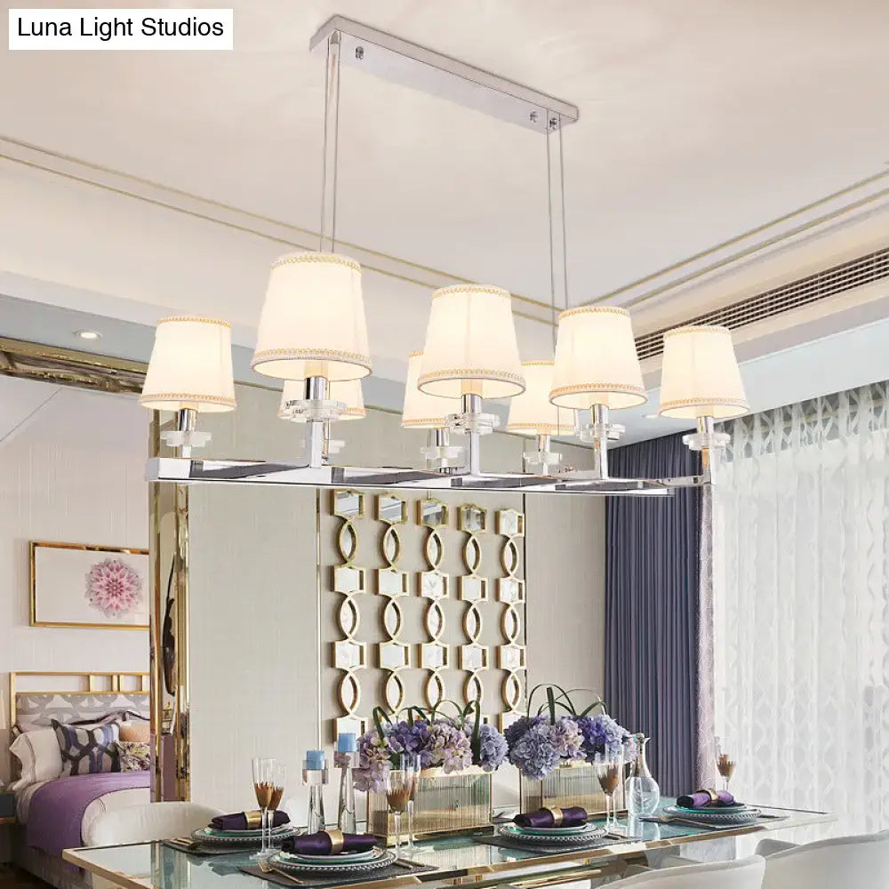 Modern chrome pendant light fixture with fabric shades dining room