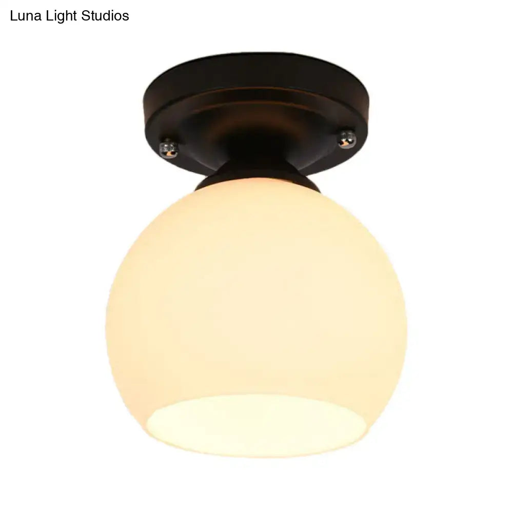 Vintage bronze semi flush ceiling light with glass shade hallway