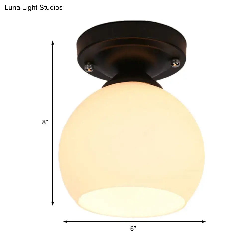 Vintage bronze semi flush ceiling light with glass shade hallway