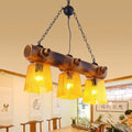 Rustic bamboo yellow water glass pendant light – dining room