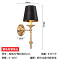 Elegant black & gold wall lamp for bedroom with textured shade