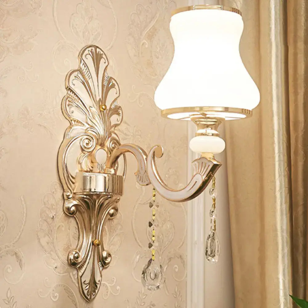 Elegant gold scrolled arm wall mount sconce bedroom crystal light