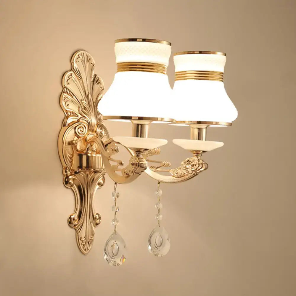 Elegant gold scrolled arm wall mount sconce bedroom crystal light