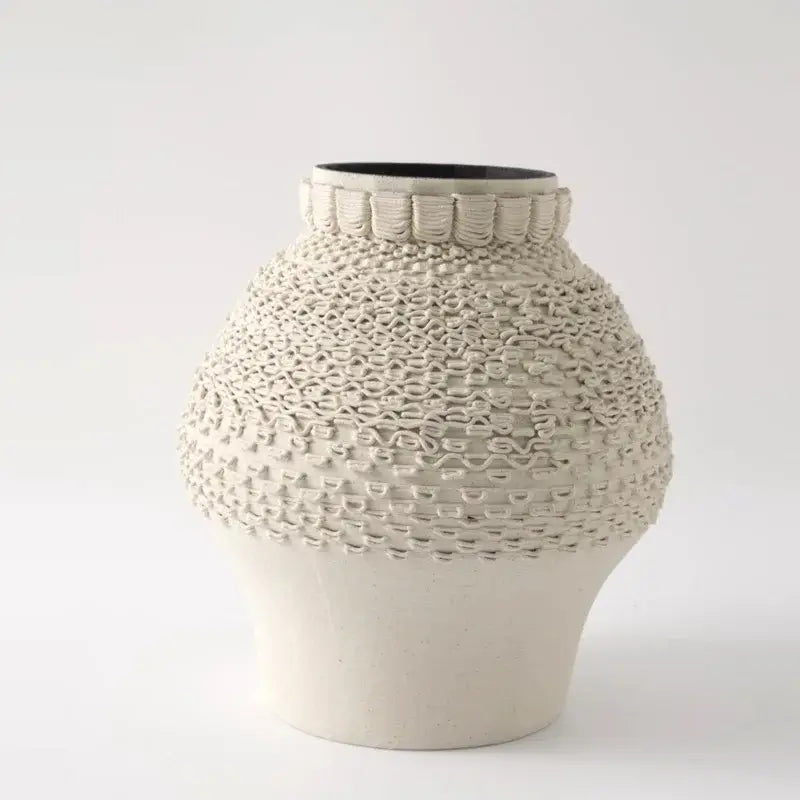 Geometric folding cream and black ceramic vase living room decor