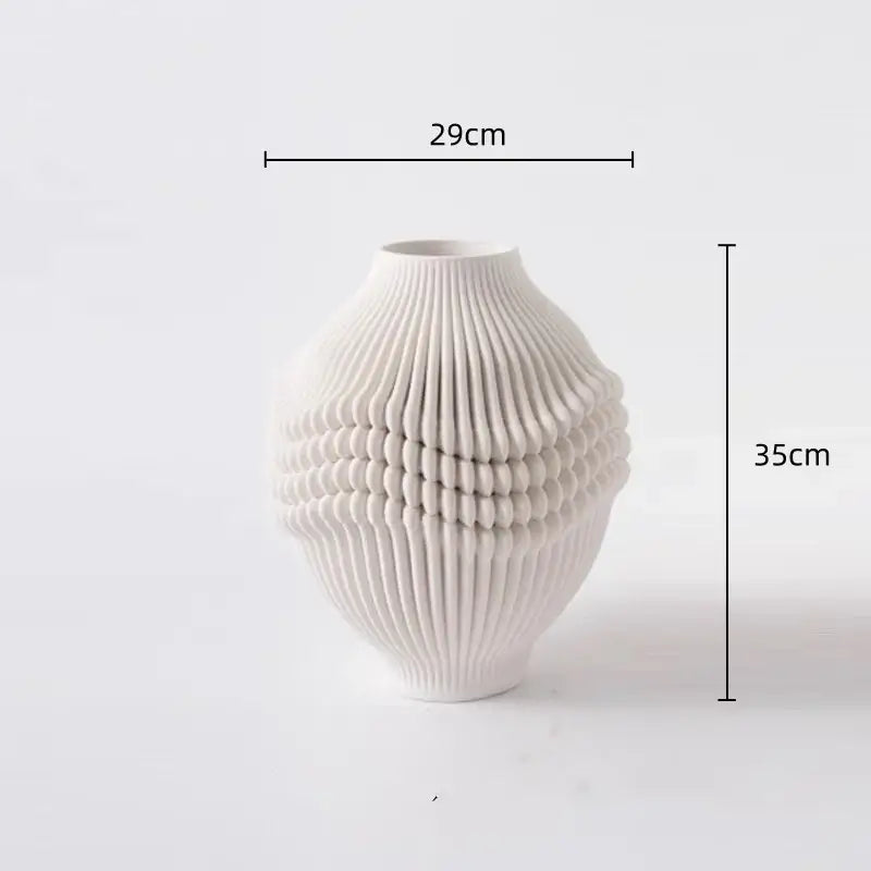 Geometric folding cream and black ceramic vase living room decor