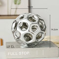 Geometric golden hollow ceramic spheres living room decor