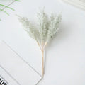 Golden artificial autumn branches set living room decor