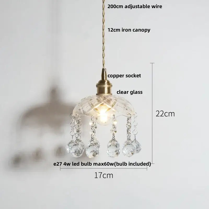 Green glass pendant light with copper canopy for dining room
