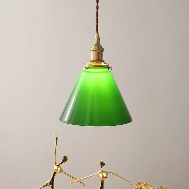 Green glass pendant light with copper canopy for dining room