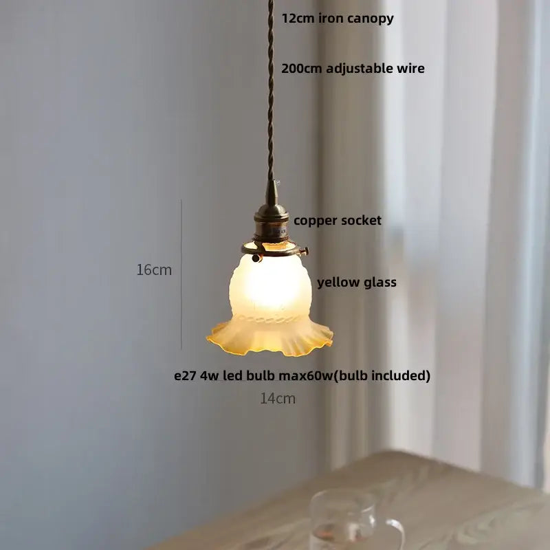 Green glass pendant light with copper canopy for dining room