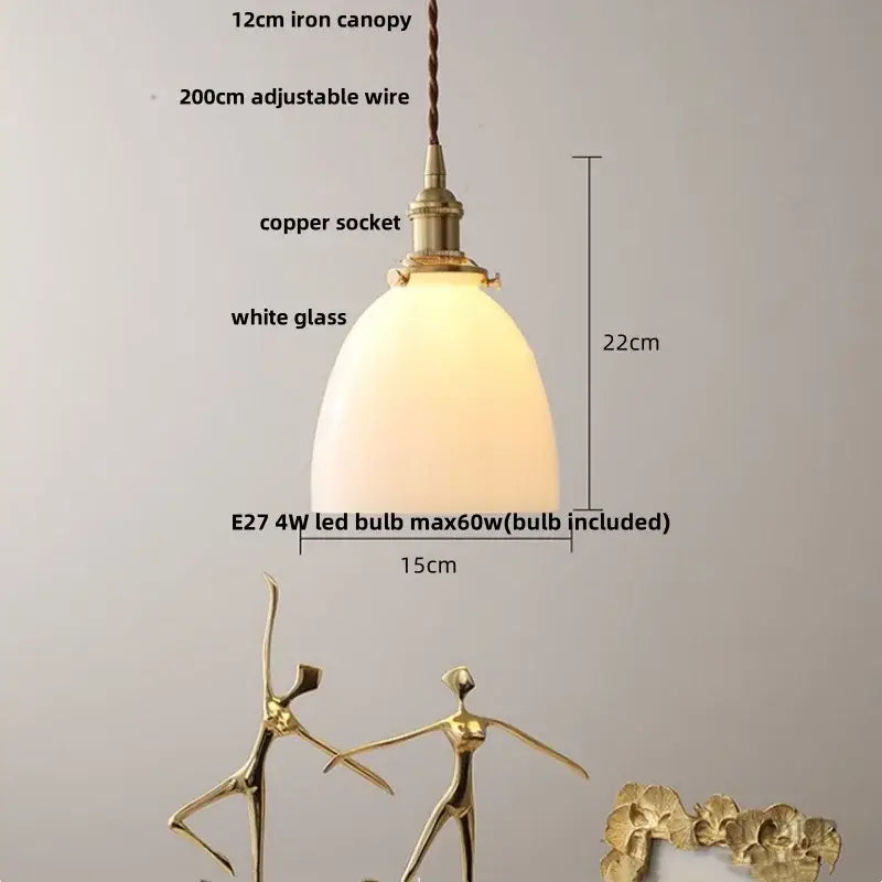 Green glass pendant light with copper canopy for dining room