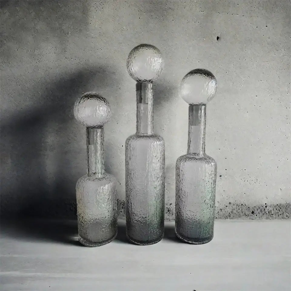 Grey round glass vase set with hammer lid stoppers living room