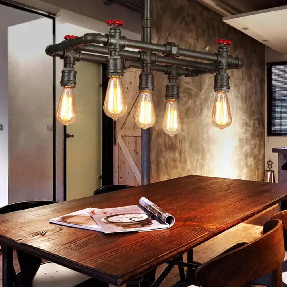 Industrial black pipe hanging ceiling light – dining room red accents