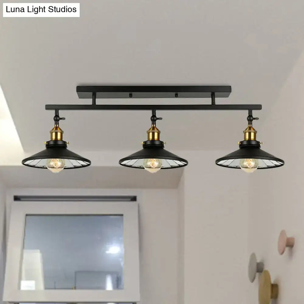 Industrial black metal and brass ceiling light fixture dining room