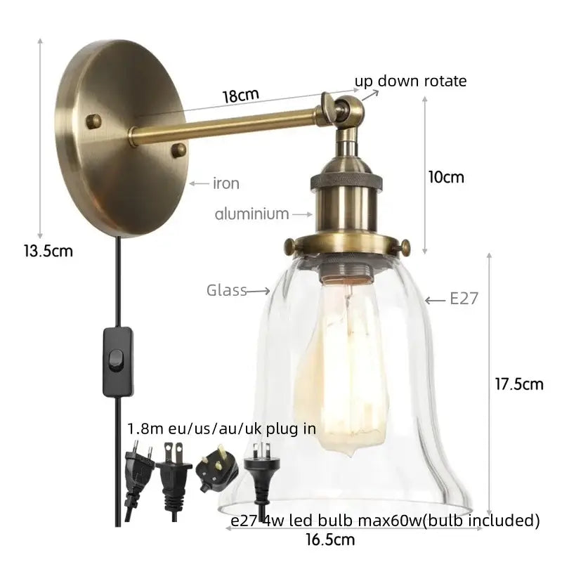 Industrial brass and clear glass wall sconce for bedroom