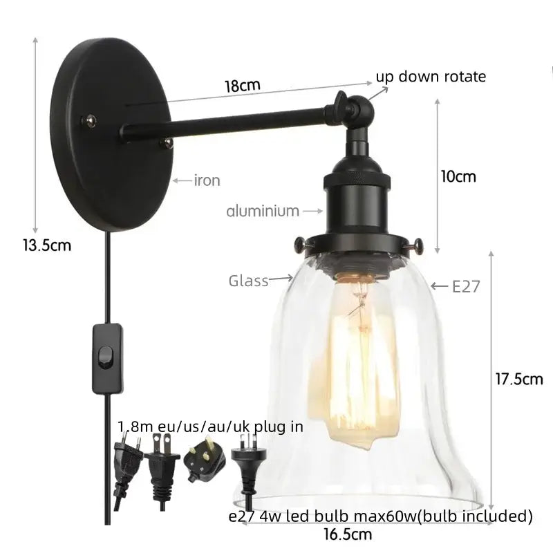 Industrial brass and clear glass wall sconce for bedroom