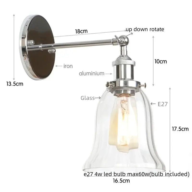 Industrial brass and clear glass wall sconce for bedroom