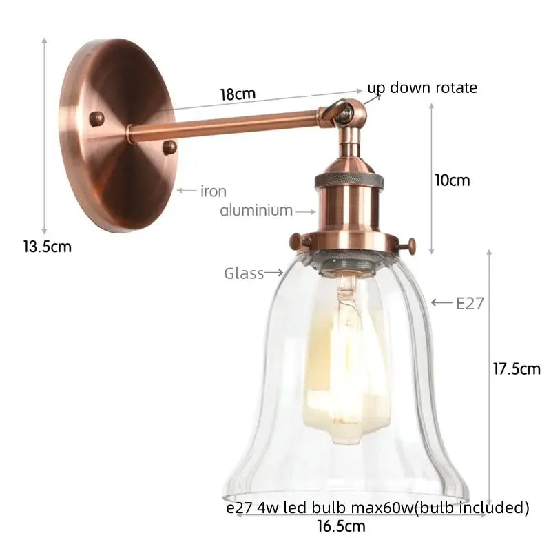 Industrial brass and clear glass wall sconce for bedroom
