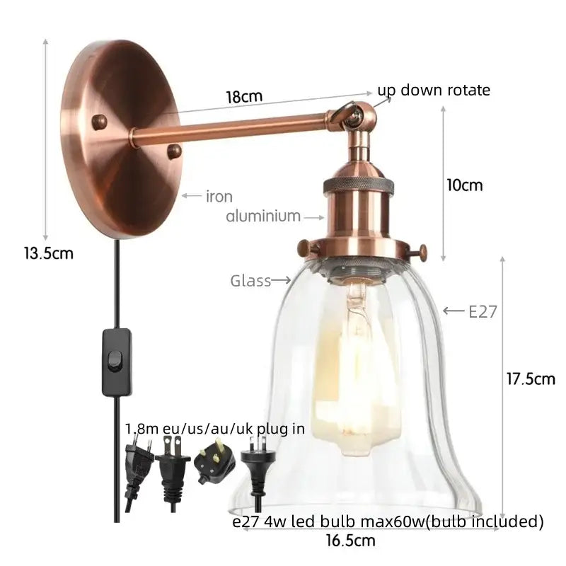 Industrial brass and clear glass wall sconce for bedroom