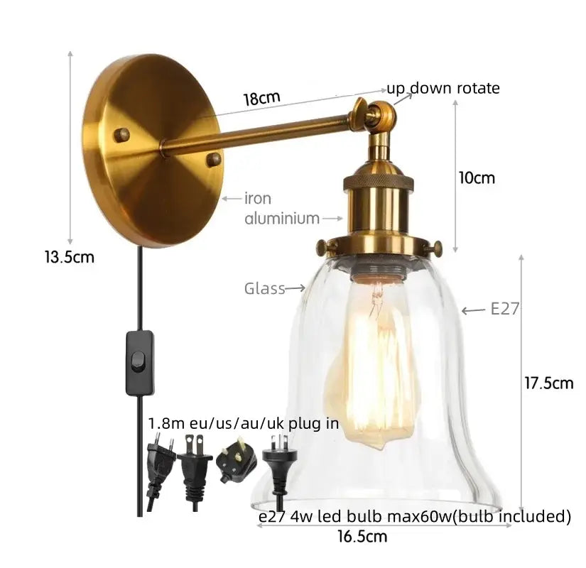 Industrial brass and clear glass wall sconce for bedroom