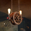 Industrial brass gear pendant light dining room with red accents