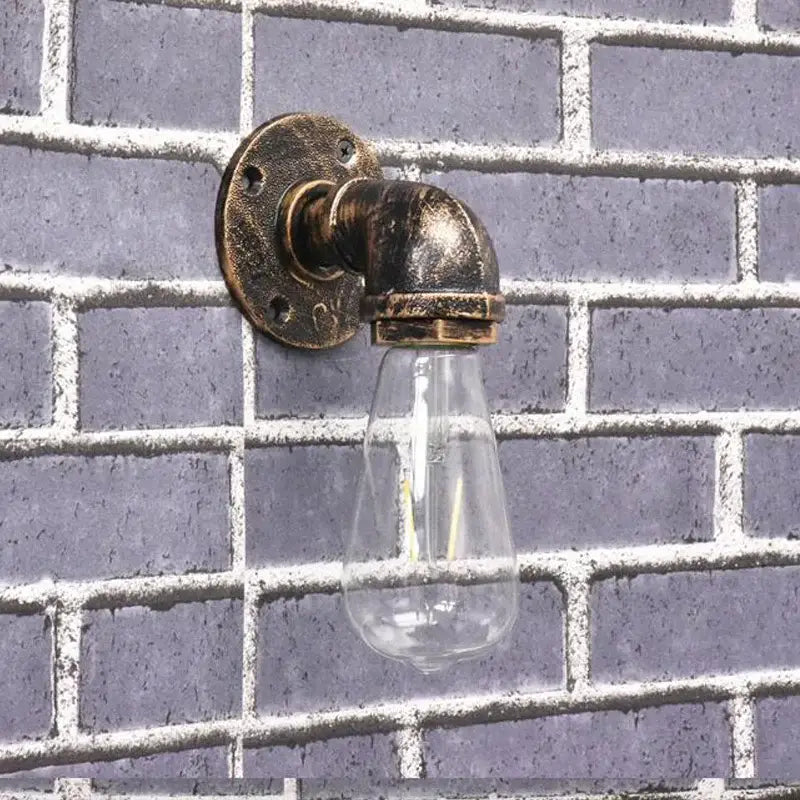 Industrial brass pipe wall sconce bedroom filament bulb light