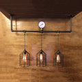Industrial bronze linear hanging light with pressure gauge kitchen island