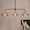 Industrial cage flared black and brass pendant light dining room