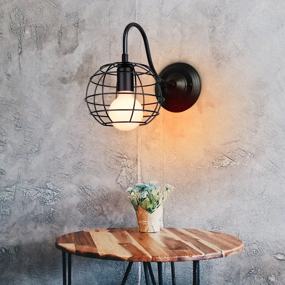 Industrial iron wall sconce black cage light bedroom fixture