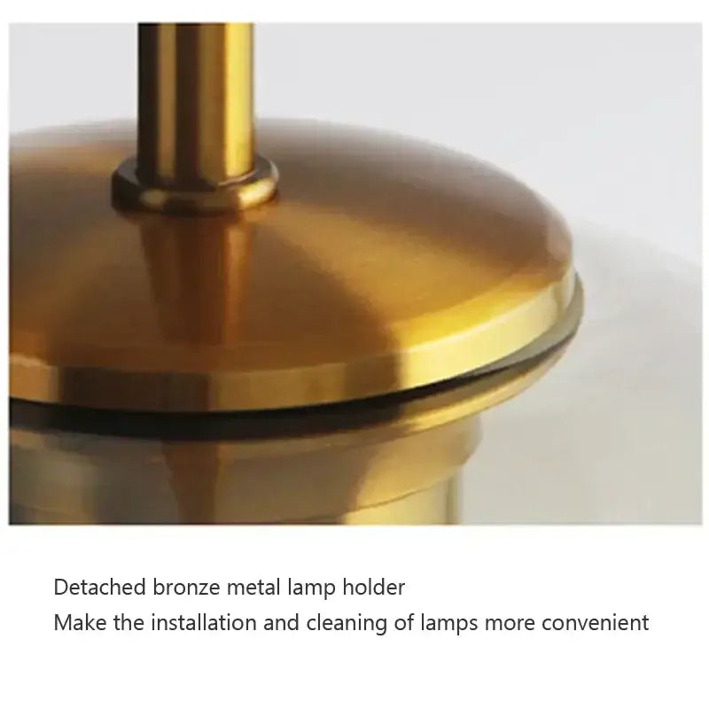 Industrial smoked glass and brass pendant light – dining room