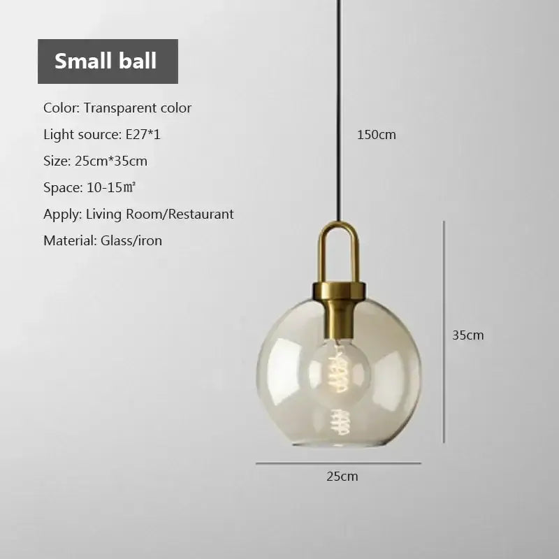Industrial smoked glass and brass pendant light – dining room