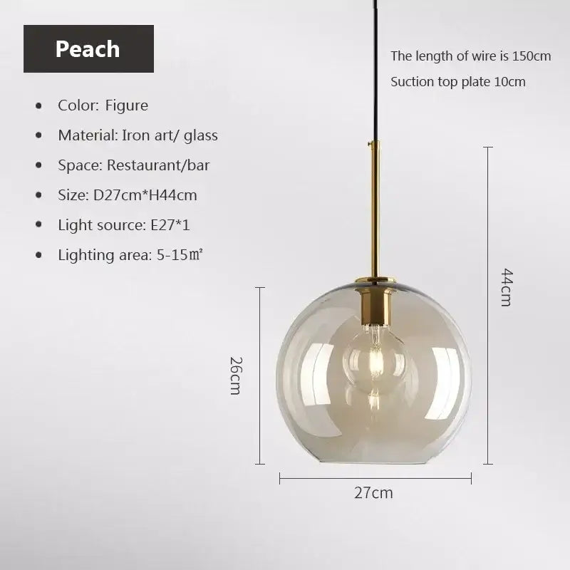 Industrial smoked glass and brass pendant light – dining room