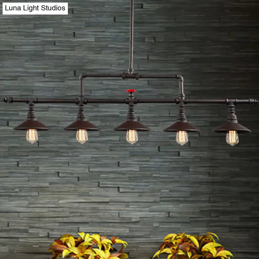 Industrial style rust pendant light with red valve – dining room