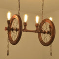 Industrial weathered copper bicycle wheel hanging light dining room