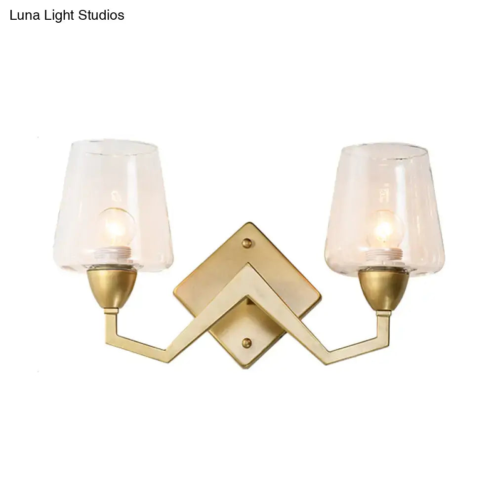 Mid-century brass wall lamp with truncated cone shade for bedroom