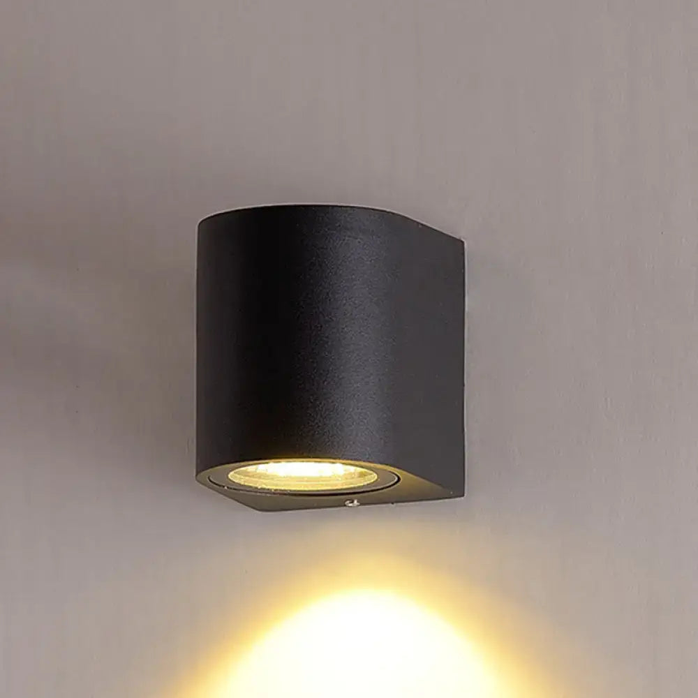 Minimalist black aluminum outdoor cylinder wall light outdoor space