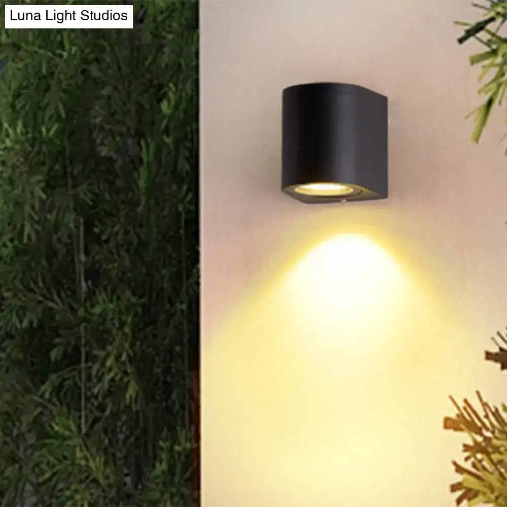 Minimalist black aluminum outdoor cylinder wall light outdoor space