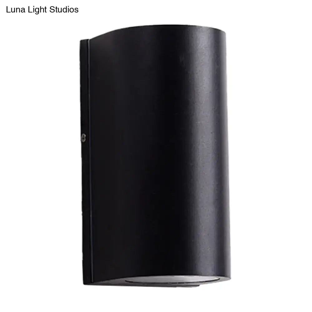 Minimalist black aluminum outdoor cylinder wall light outdoor space