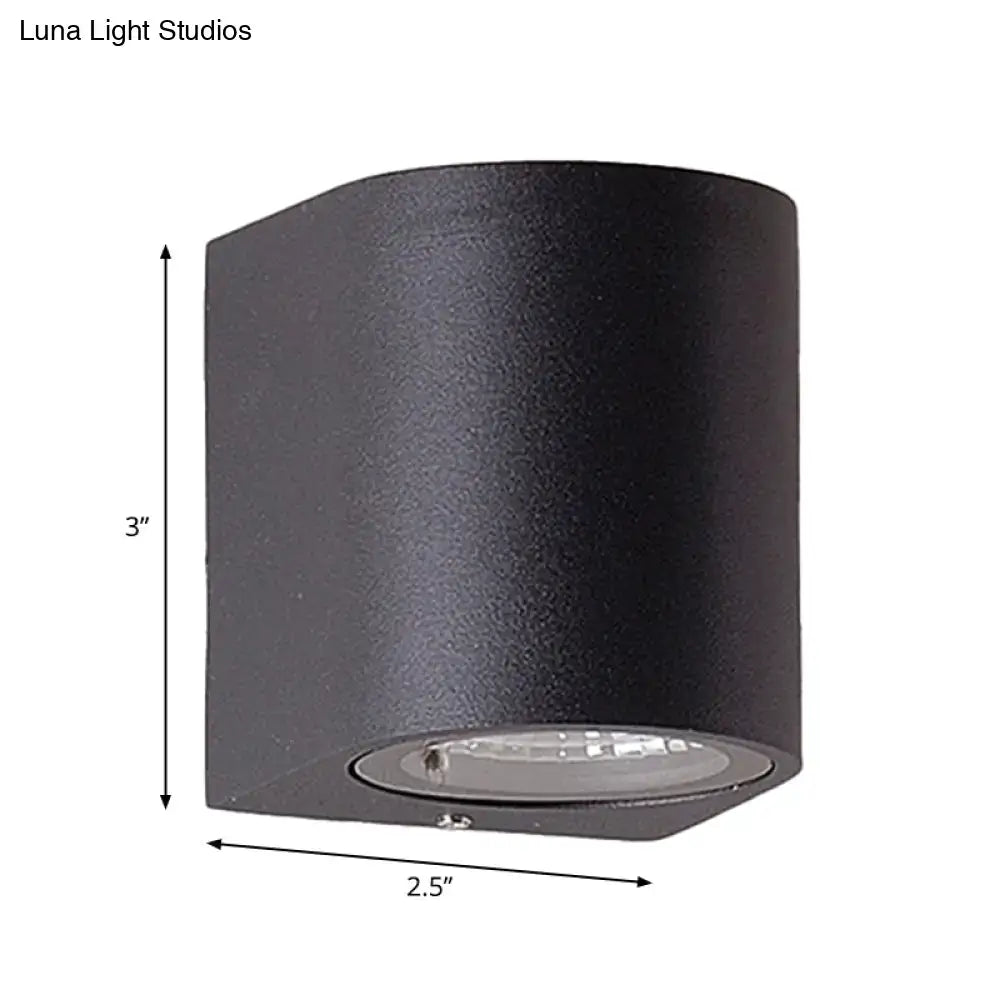 Minimalist black aluminum outdoor cylinder wall light outdoor space