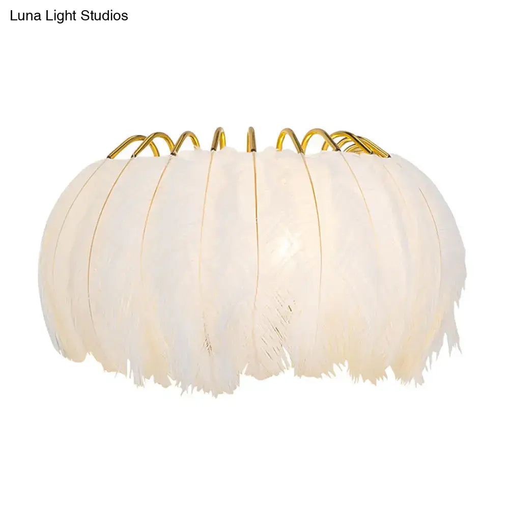 Minimalist black and gold feather wall sconce bedroom light type