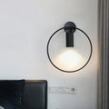 Minimalist black circular metal sconce – living room wall light